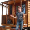 Jay outside his tiny home